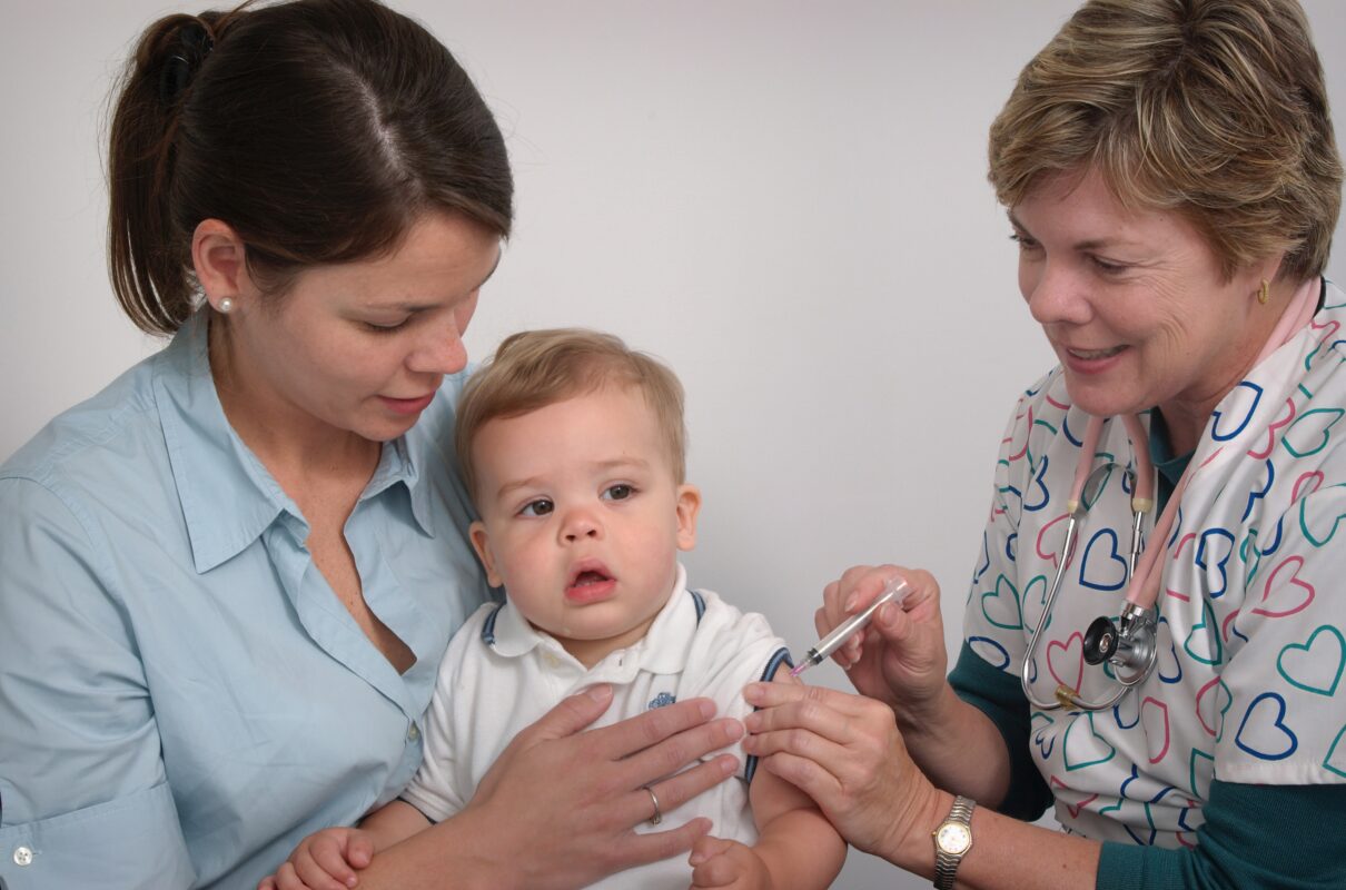 An image representing the process of vaccination, with a focus on child health and immunity. Child Vaccination